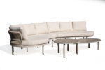 54205 wicker outdoor sofa beside a luxury poolside resort